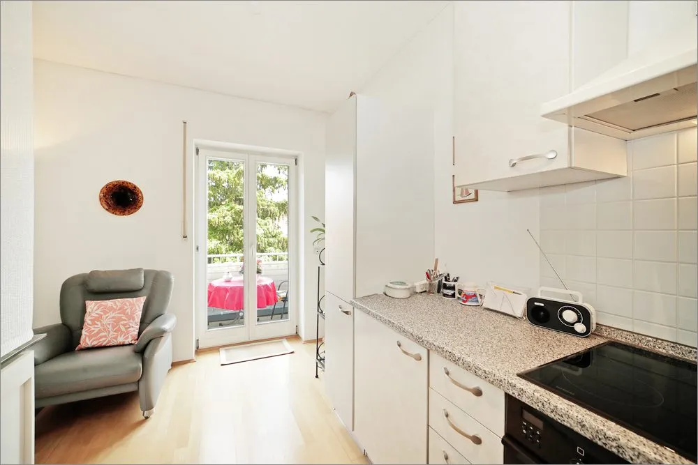 Immobilienangebot - München - Alle - Dachgeschosswohnung mit Balkon und TG-Stellplatz – Gepflegte Kapitalanlage in München-Forstenried